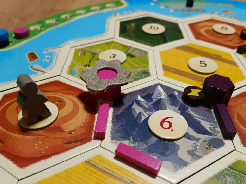 Catan Energie - inspektor a poškozené město