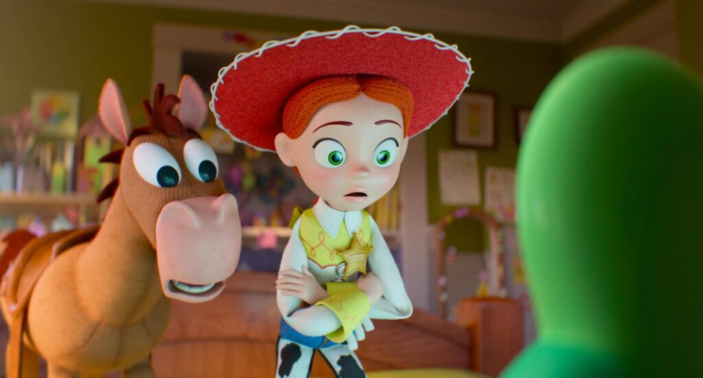 Toy Story 5 Příběh hraček - Jessie a Bulík koukají do Žabletu